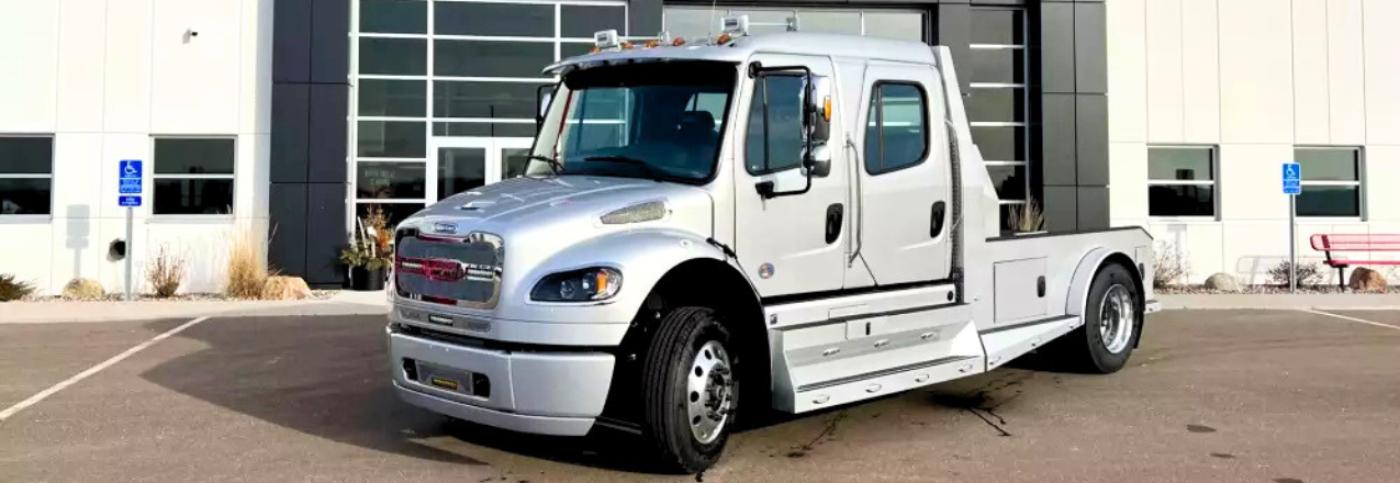 The 2024 Freightliner Summit Hauler in Front of Boyer Trucks